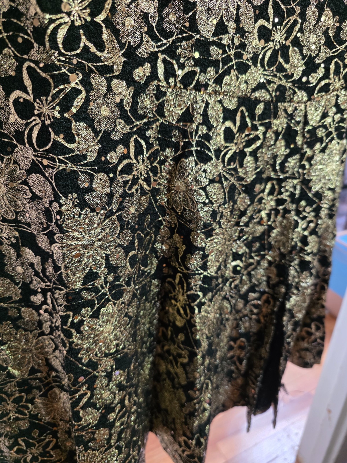 gold embelished black cocktail dress
