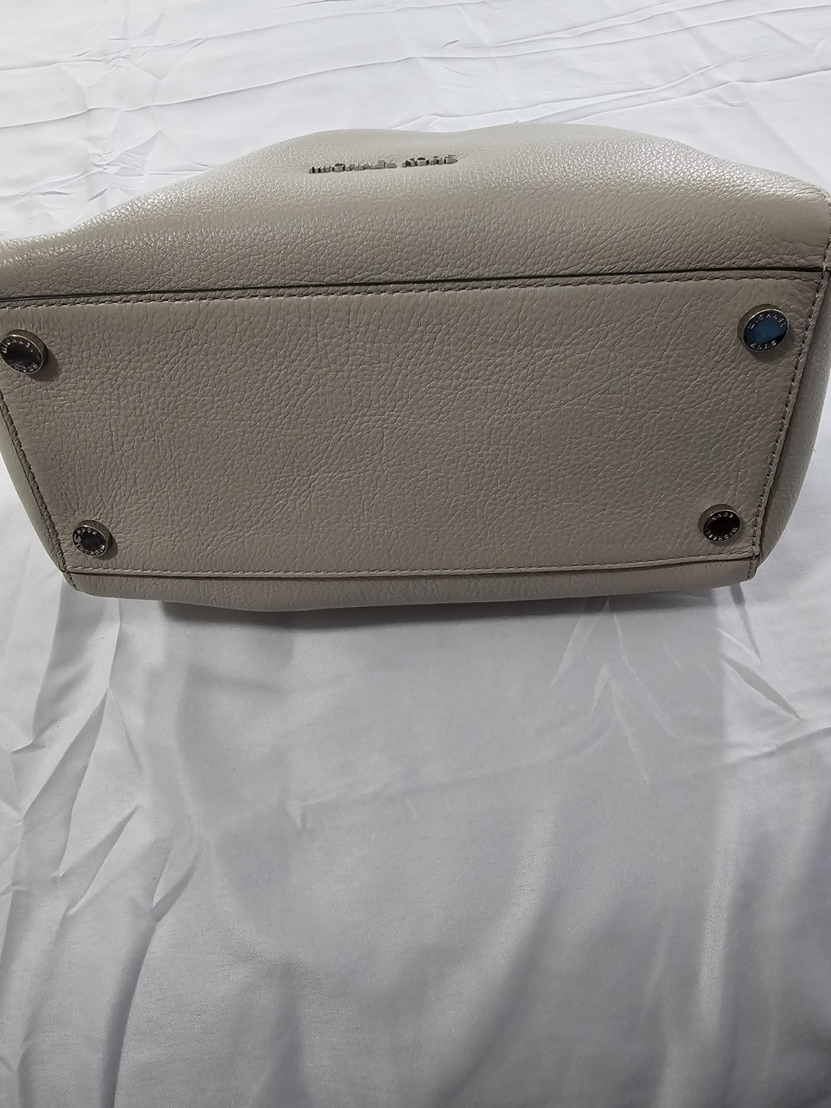 Michael Kors Kirby Large Leather Satchel feature Black Handles And Silver Logo