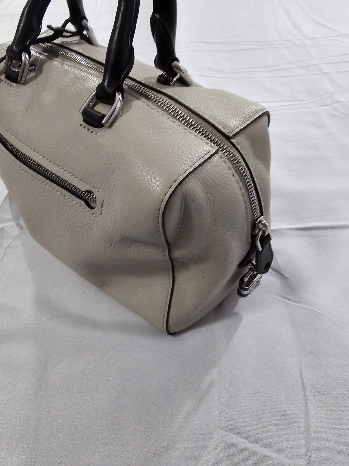 Michael Kors Kirby Large Leather Satchel feature Black Handles And Silver Logo