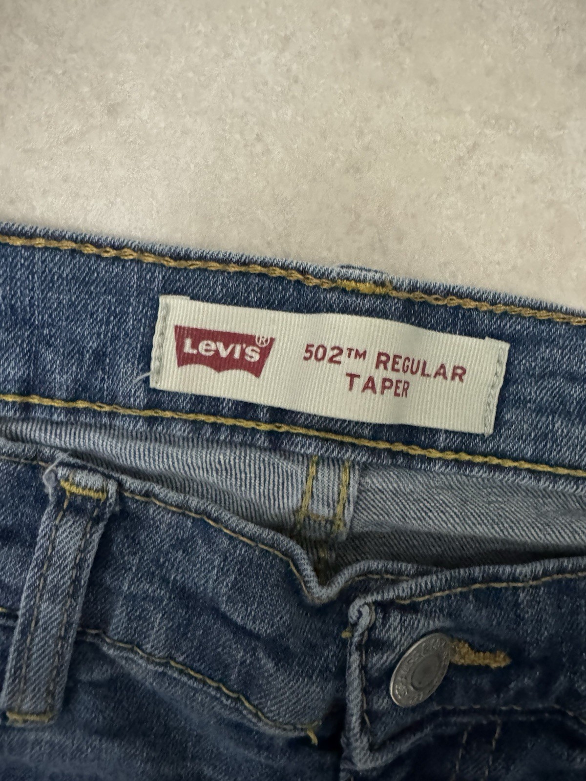 Distressed Levi’s Men’s Regular Taper Blue Denim Jeans Medium Wash