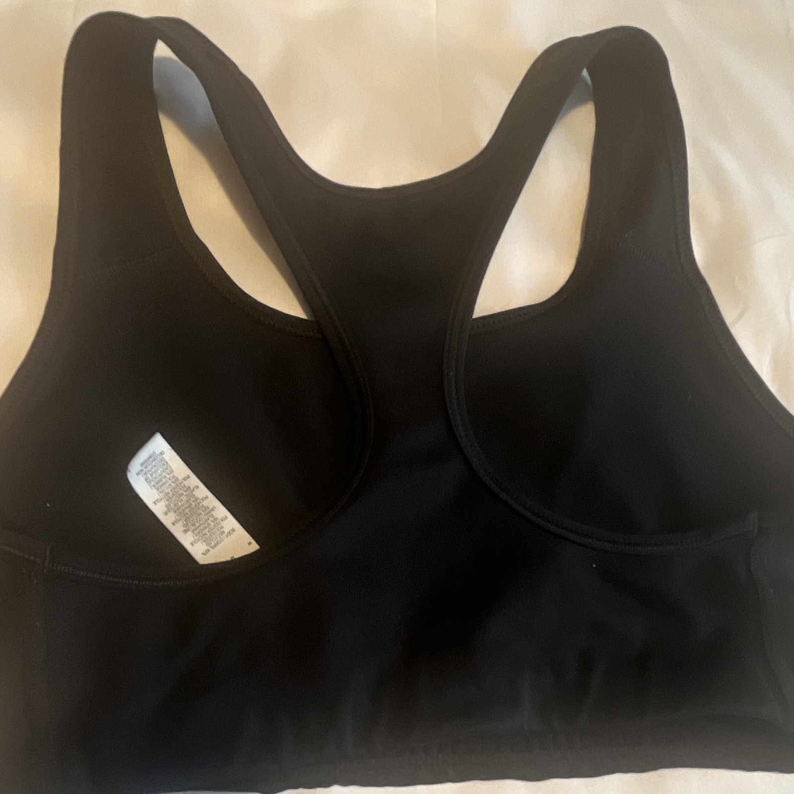 Nike Black Solid Racerback Sports Bra M Medium Support Wireless Pullover