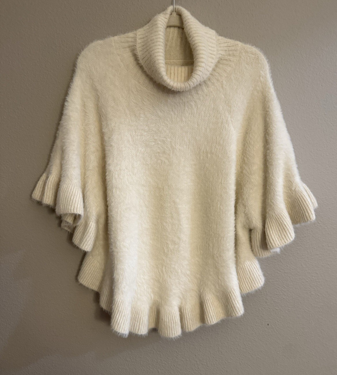 Akemi + Kin Falling Snow Fuzzy Ruffled Poncho Sweater One Size Anthropologie