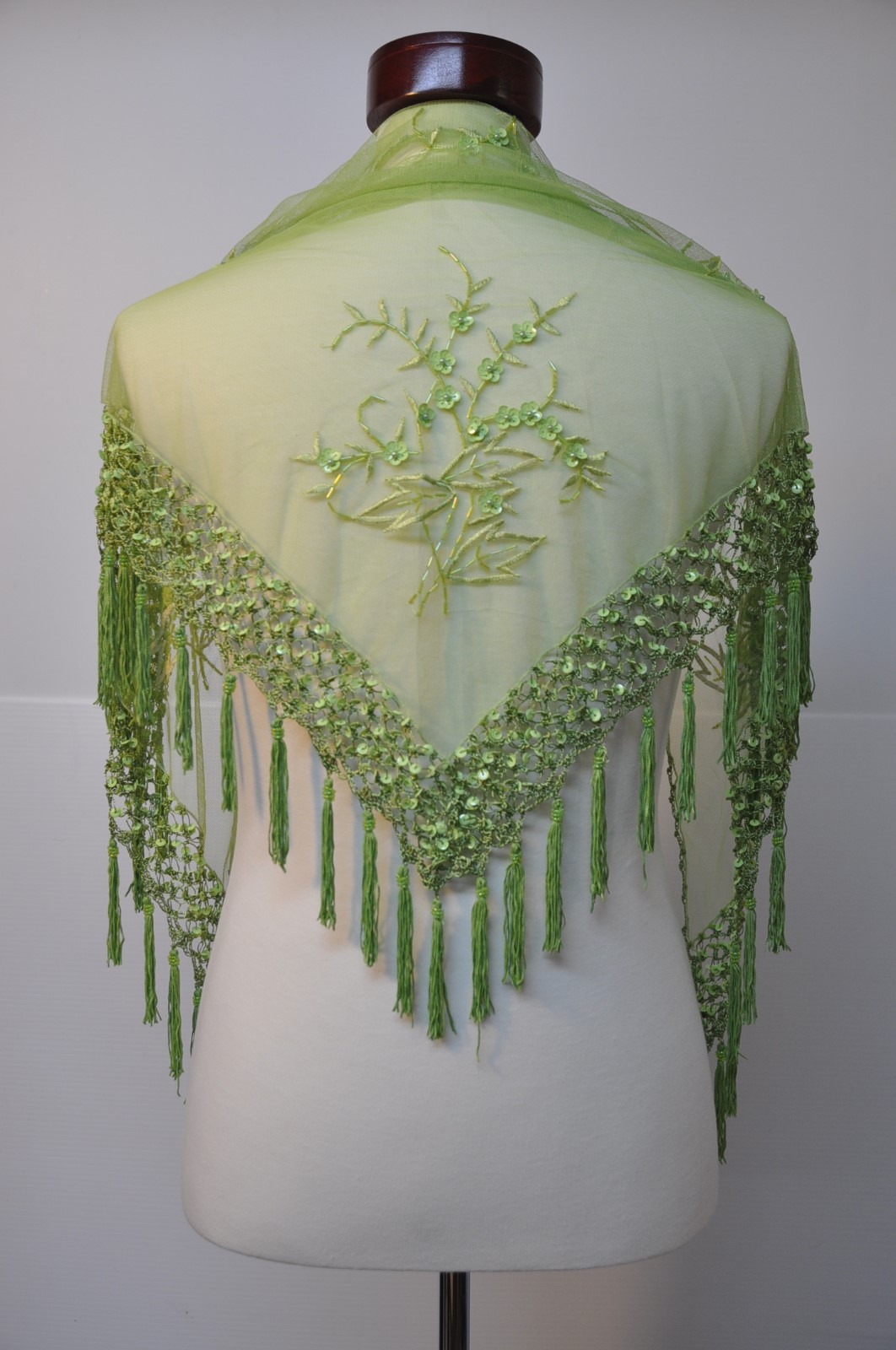 Lady’s green color triangle beaded embroidery shawl with tassel