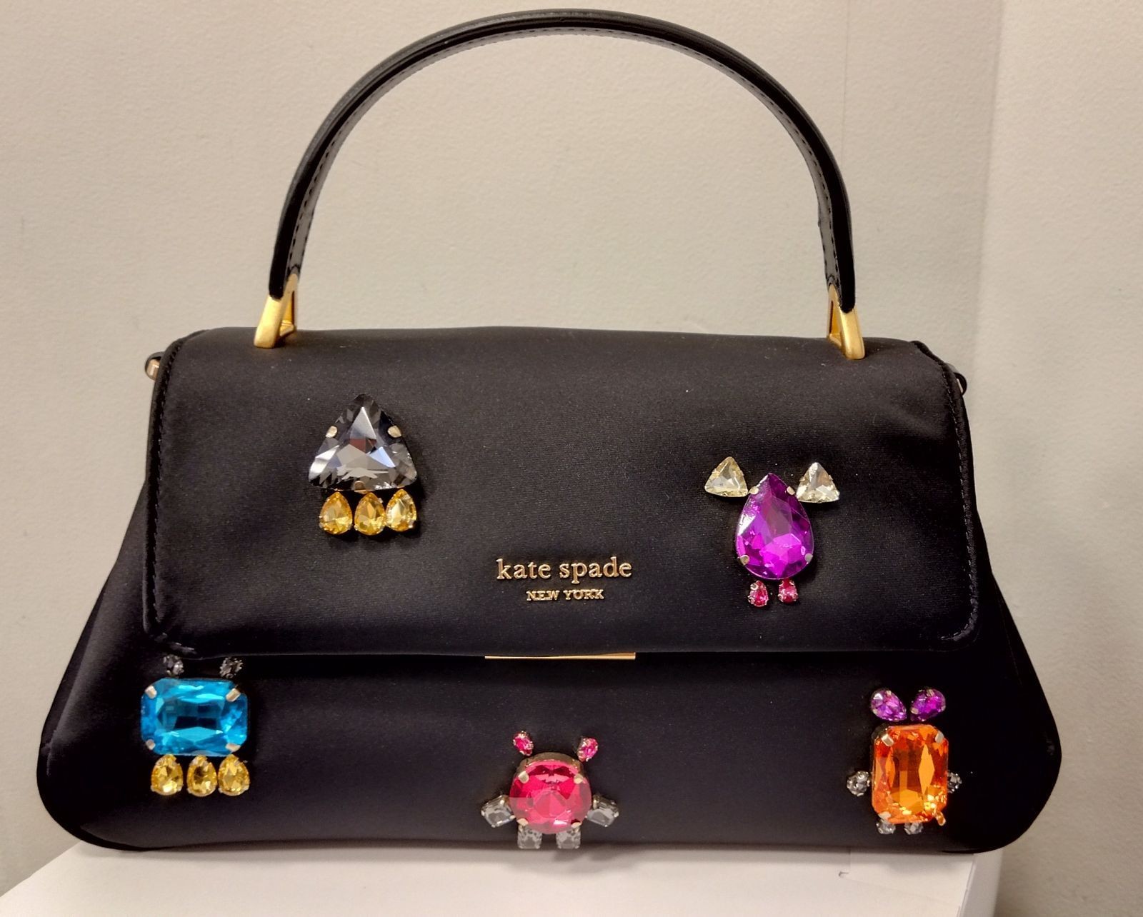 M02 Kate Spade New York Grace Embellished Satin Small Top Handle Bag featuring a