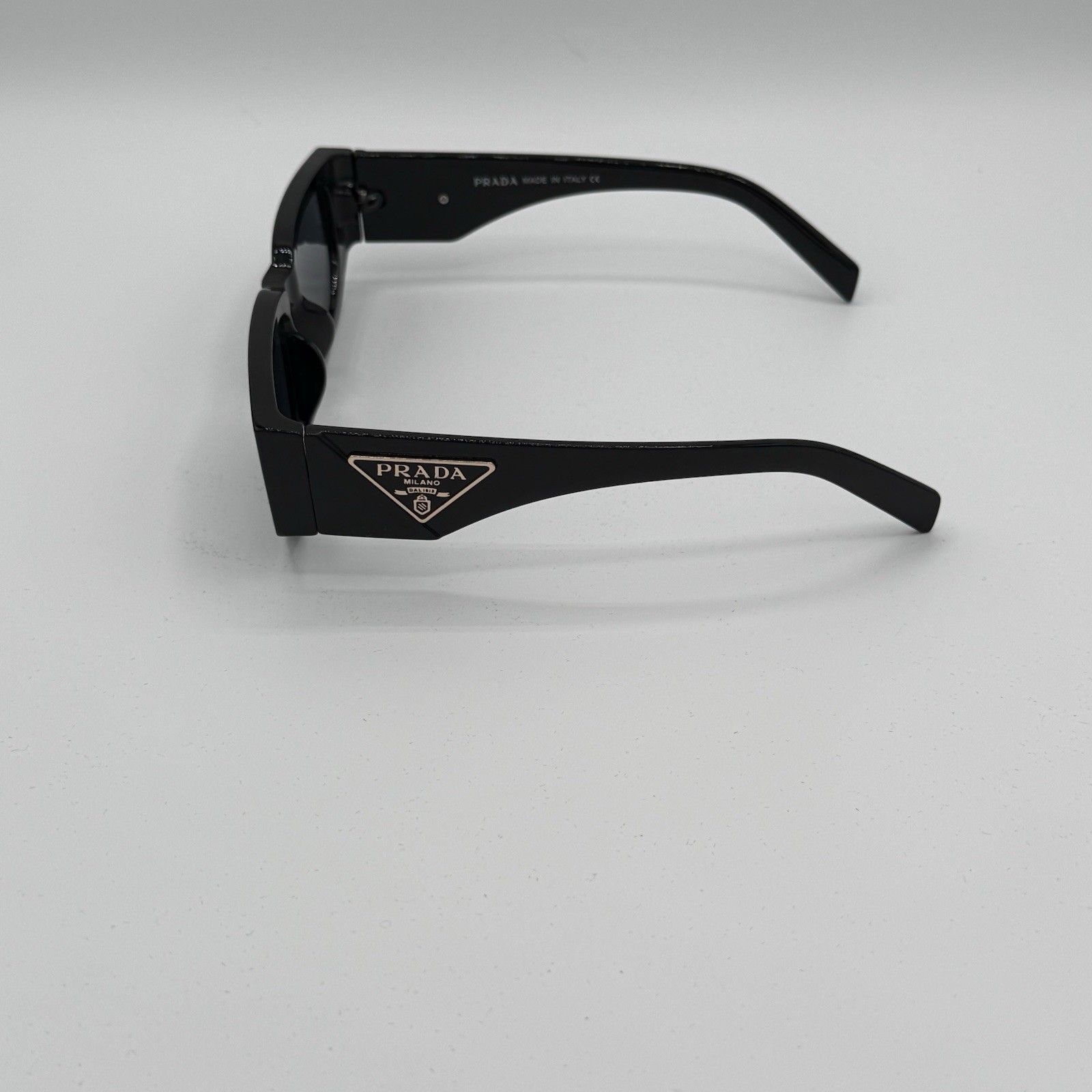 Prada PR 09ZS 1AB5S0 Unisex Sunglasses – Black/Gray