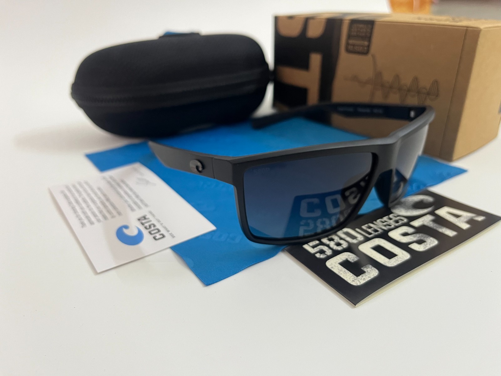 COSTA polarized – Smoke-Clear Frame W/ Blue Polarized Sunglasses 580