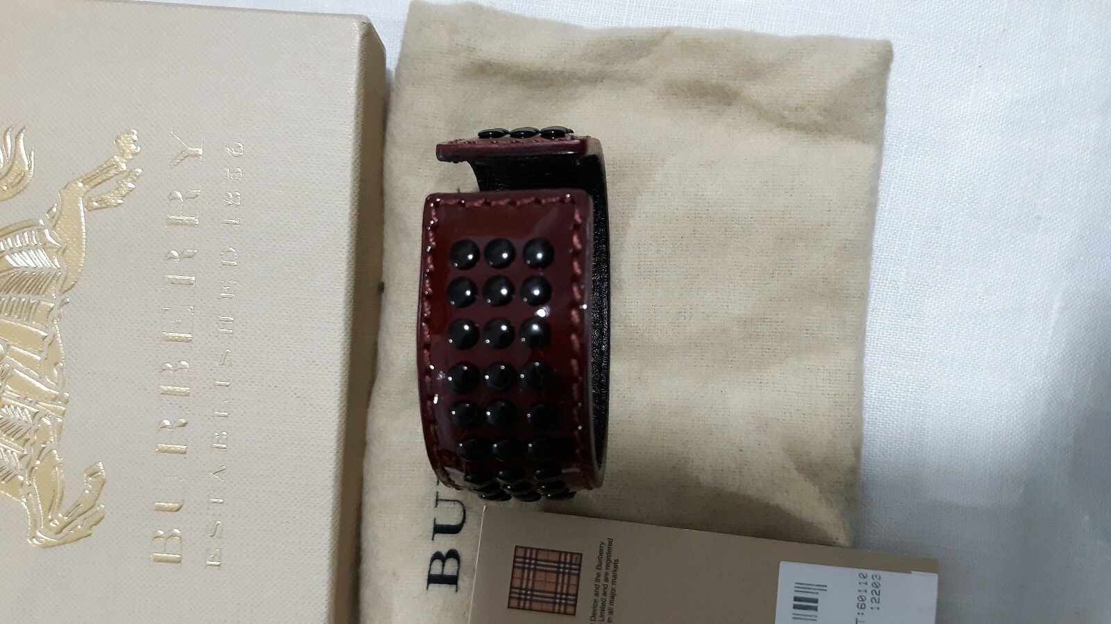 BURBERRY LEATHER CUFF BANGLE BERRY RED BLACK GROMMETS NEW TAGS UNISEX