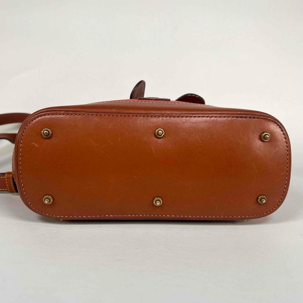 Dooney & Bourke Classic Collection All Weather Pebble Leather Red Tan Backpack