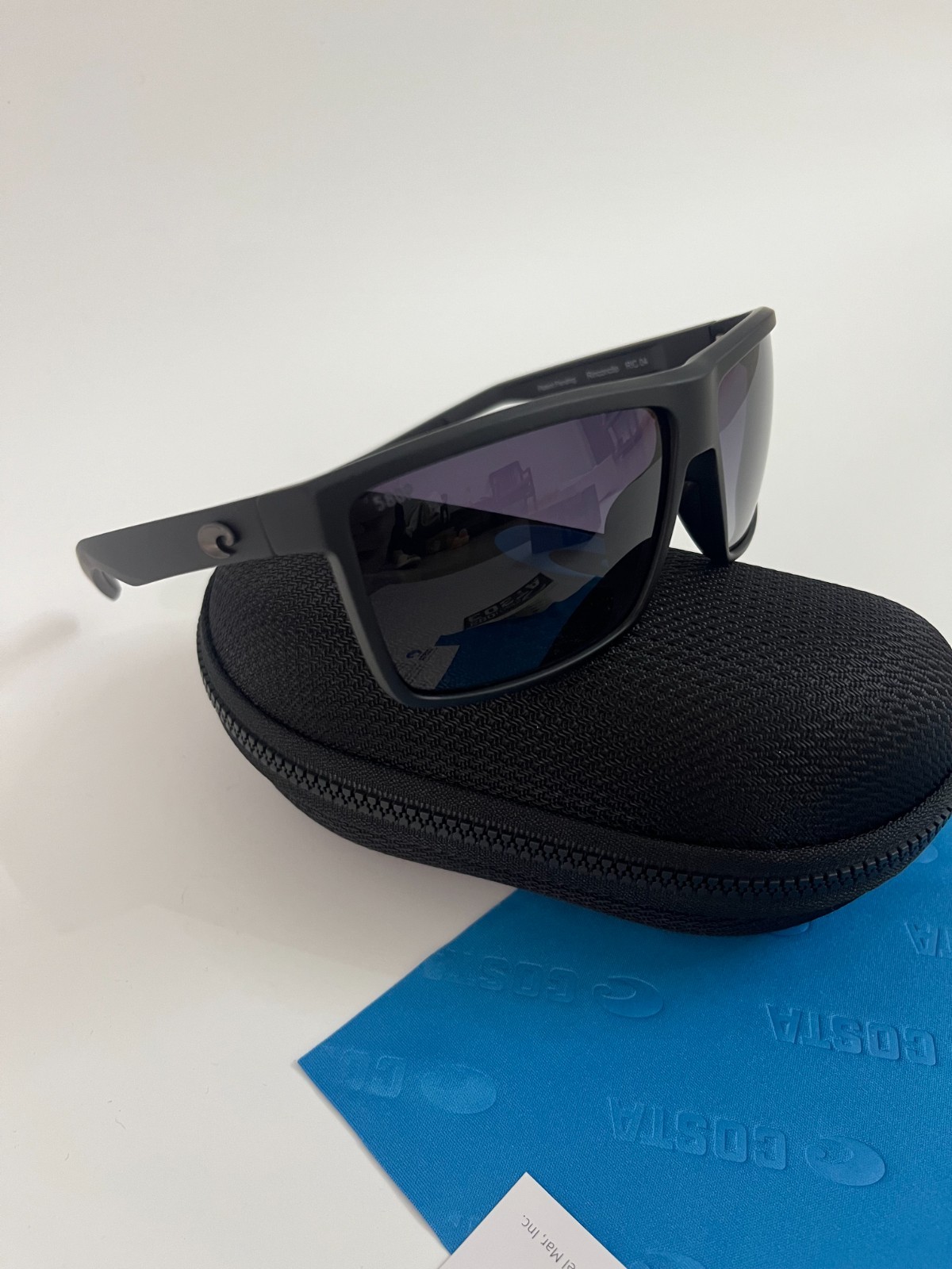 COSTA polarized – Smoke-Clear Frame W/ Blue Polarized Sunglasses 580