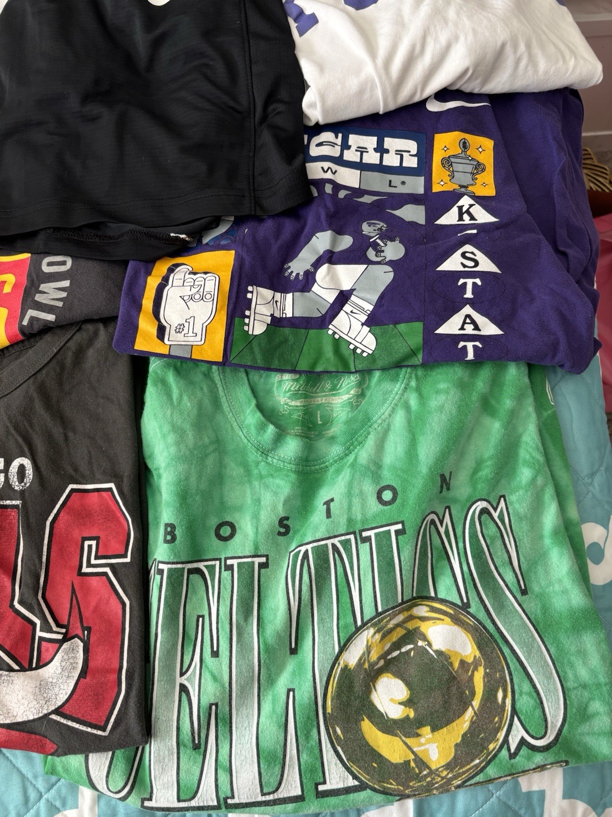 Lot of Sport Clothing. Sizes Vary. Most Shirts are Large and Shorts a S. Nike