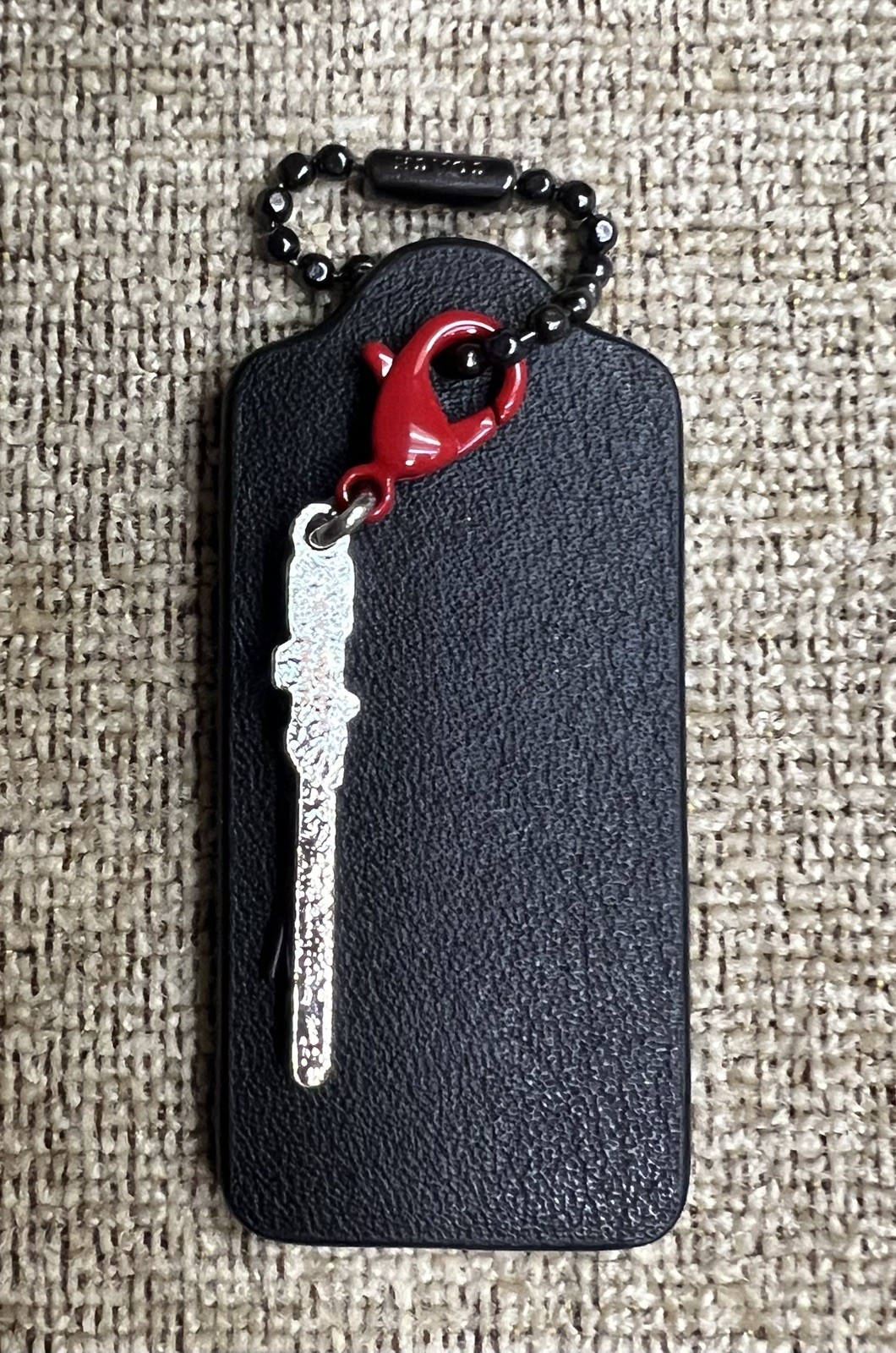 Coach Large 2.25” Black HangTag Star Wars Sith / Jedi Red Light Saber Charm New