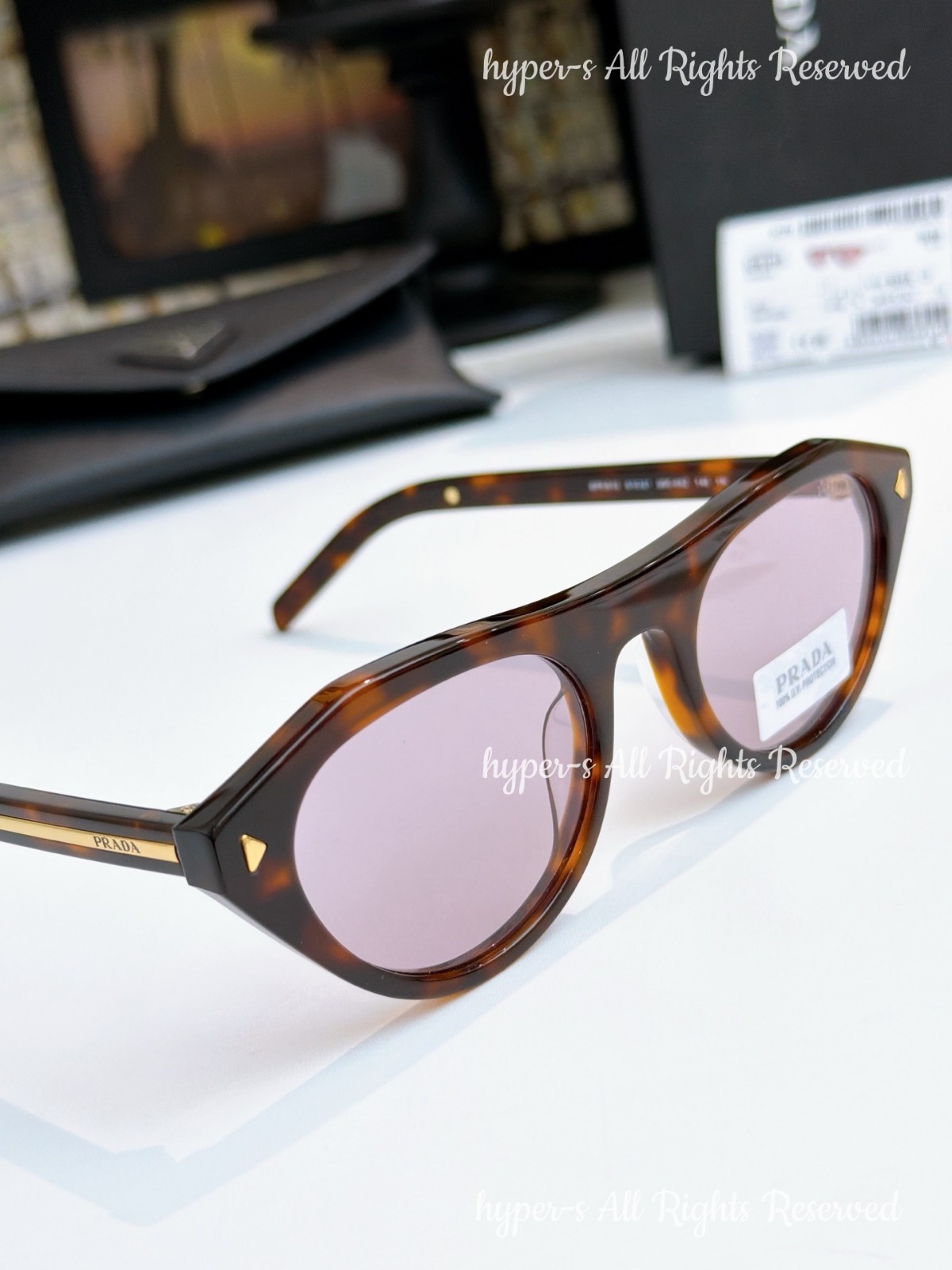 Prada SPR B15 Women Sunglasses Cat Eye Tortoiseshell Frame Purple Lenses UV400