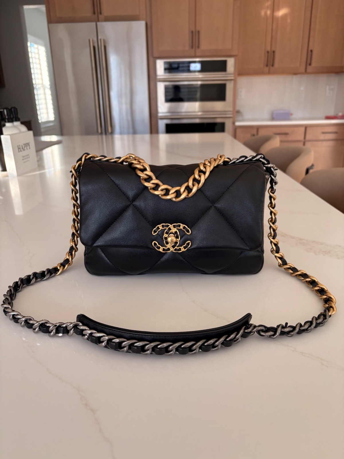 Authentic Chanel 19 in black Lambskin with mixed hardware size small