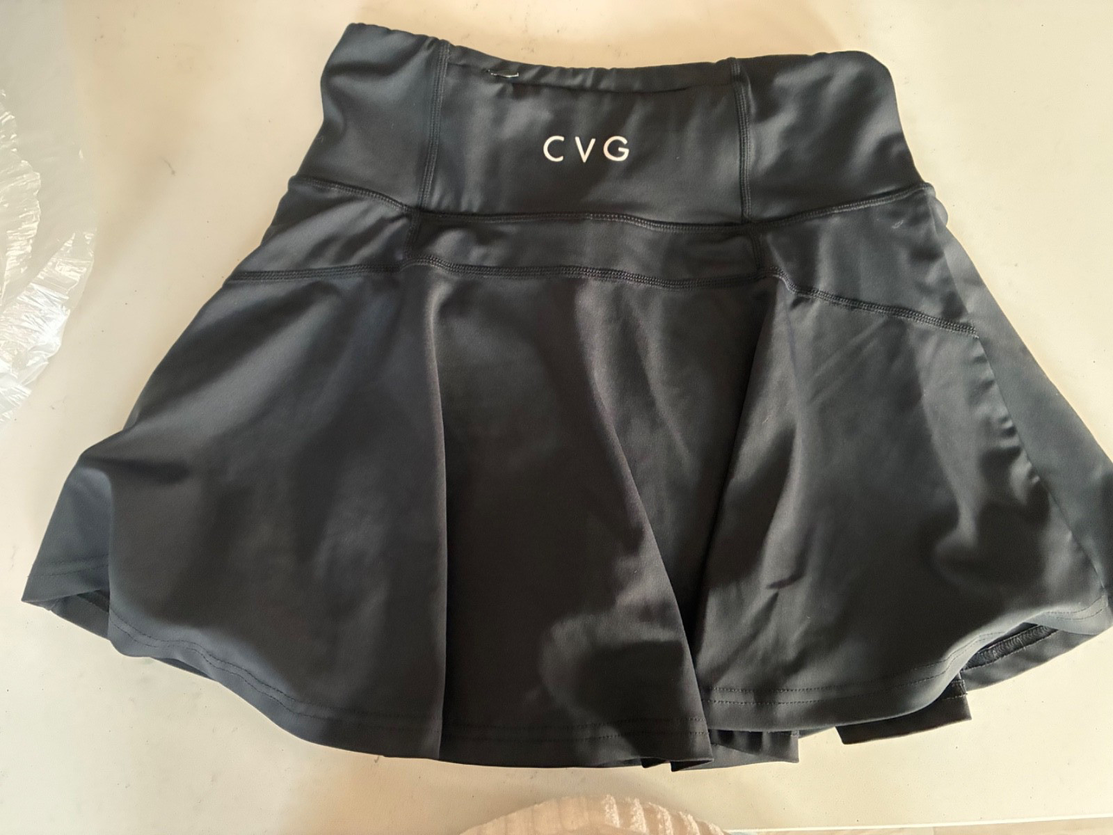 CVG Constantly Varied Gear Black Skort with zipper pocket at back