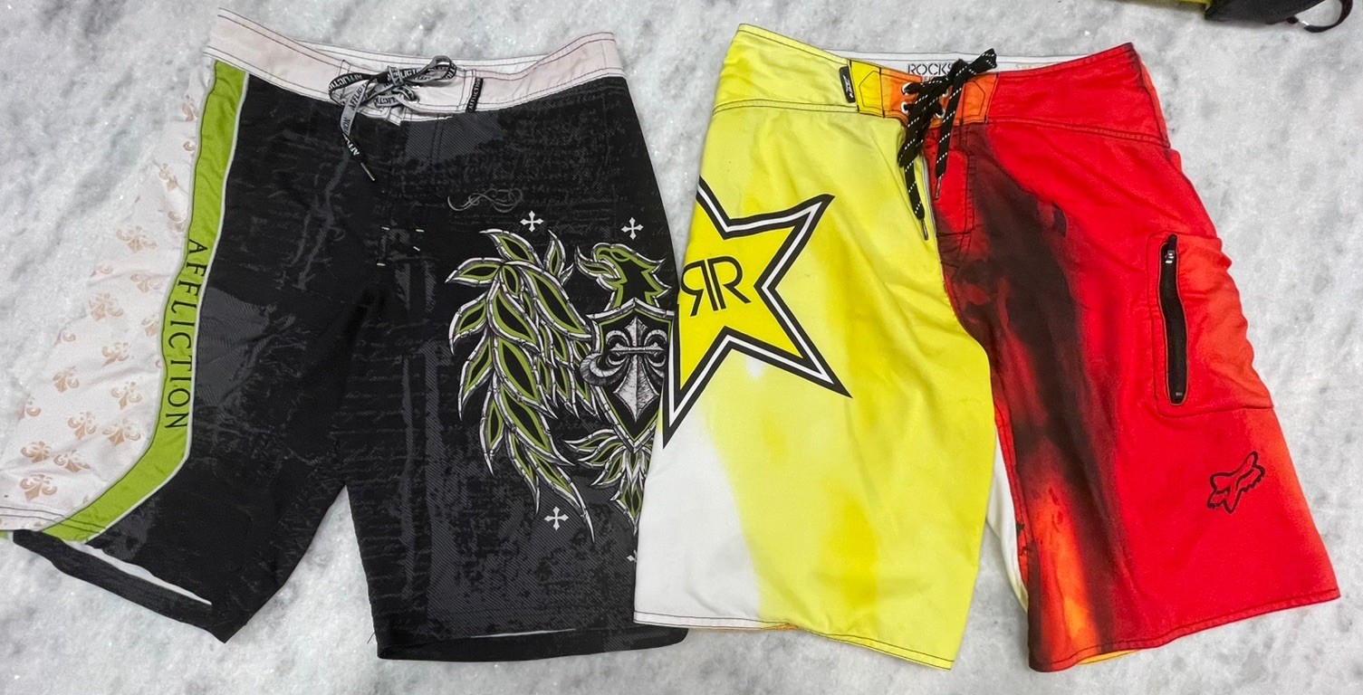 Rockstar Fox Racing Board Shorts Mens 31 and Affliction Board Shorts Mens 31.