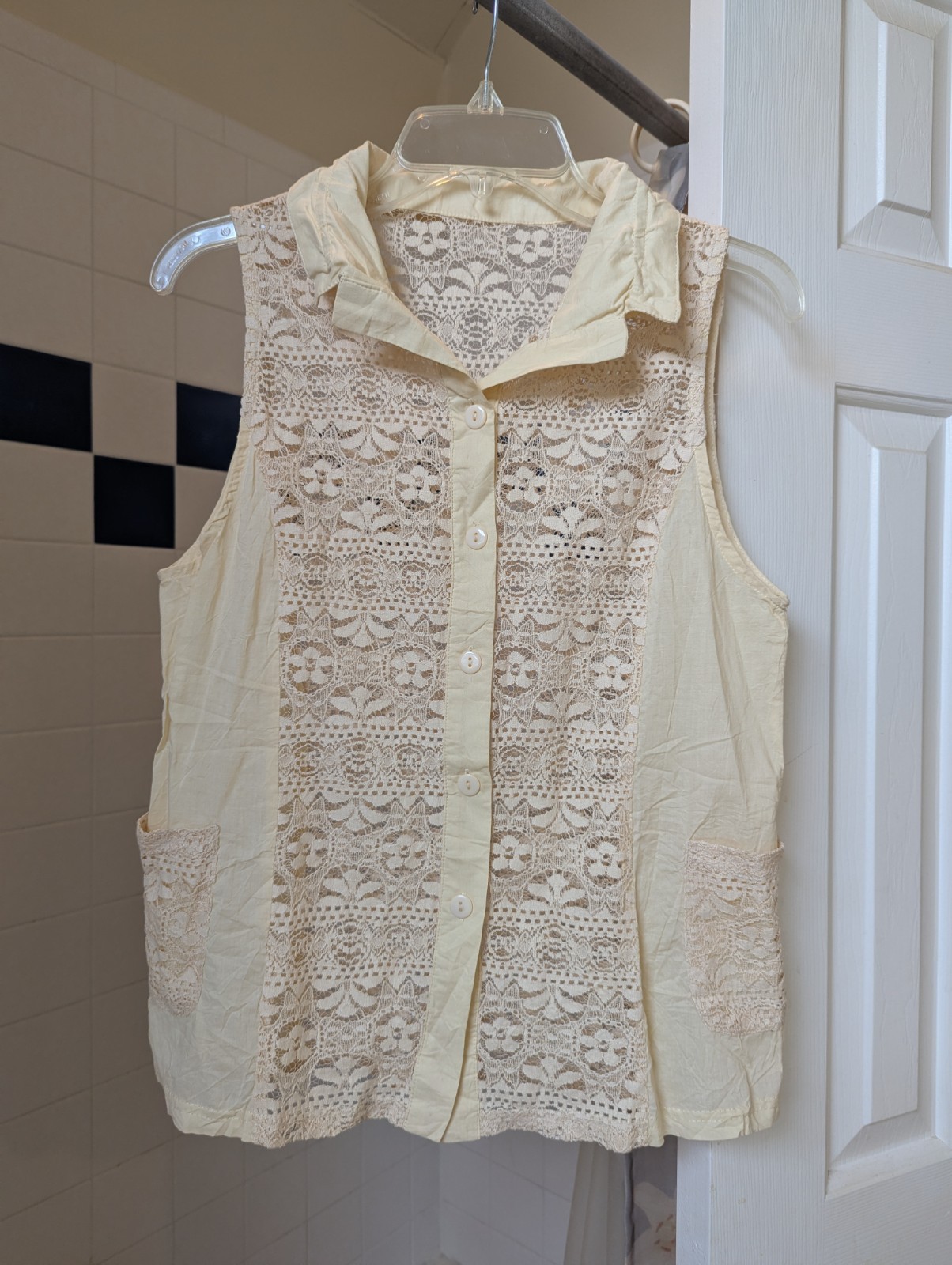 NWOT Cream sleeveless button up top with lace panels Size M