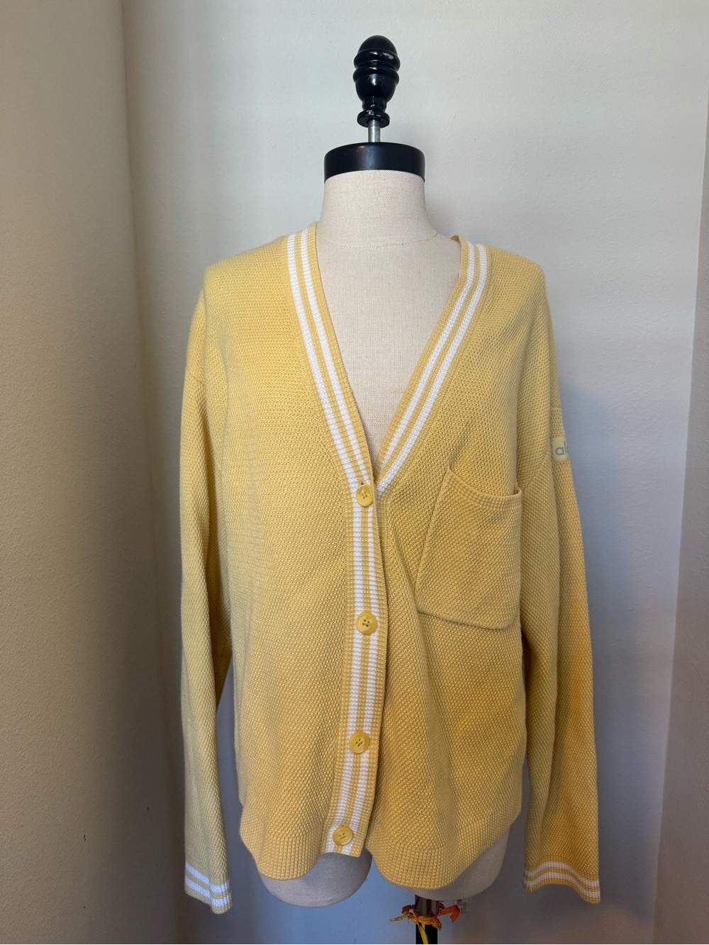 Alo Yoga “Tennis Club” cardigan in Butter Color