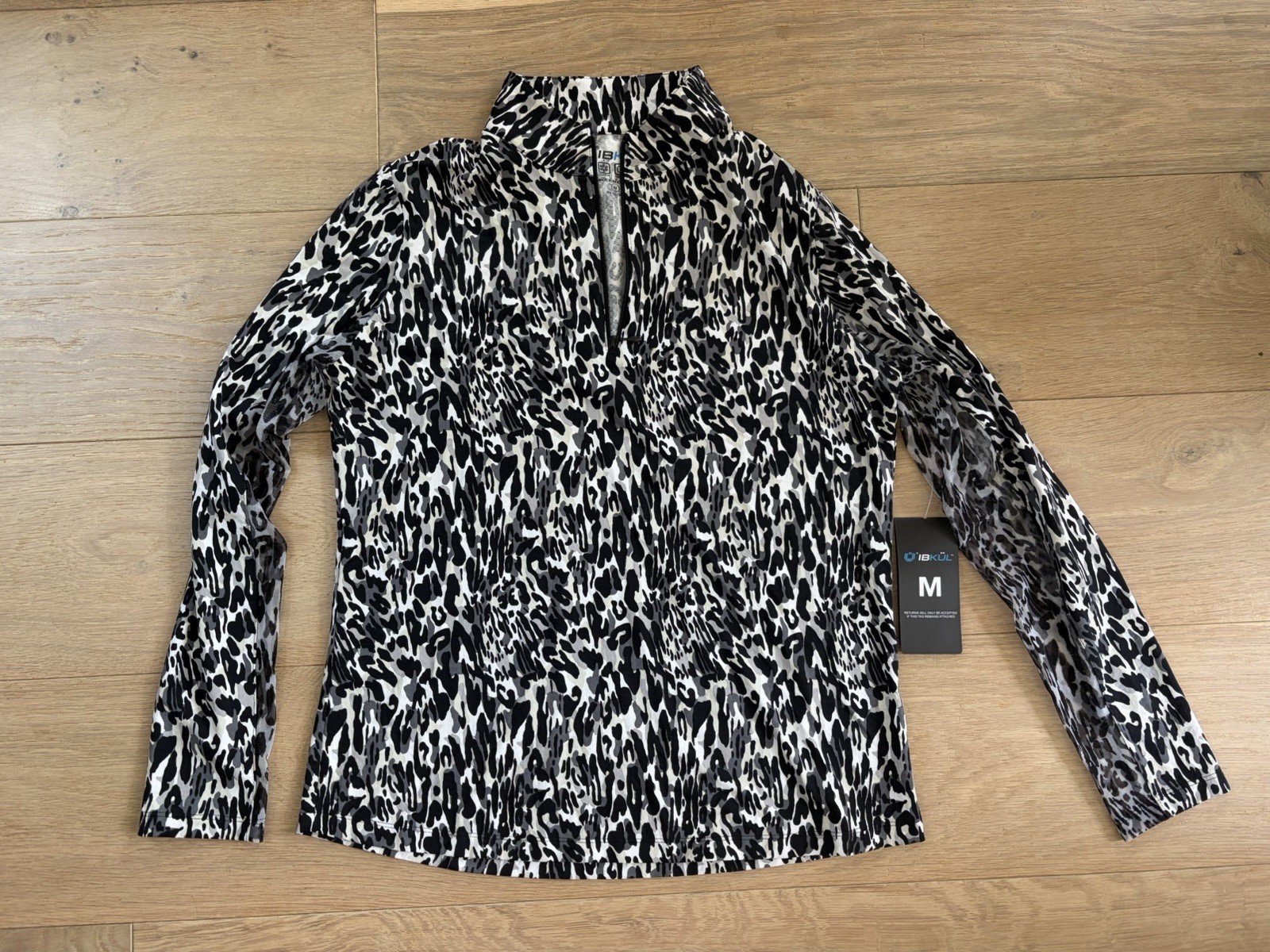 IBKUL quarter zip black and white animal print sun protection pullover – M NWT