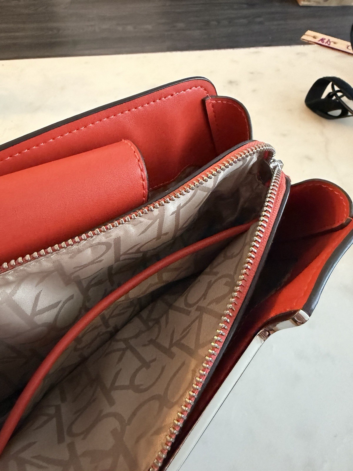 Calvin Klein Women’s Crossbody Bag Brown Monogram With Orange Leather