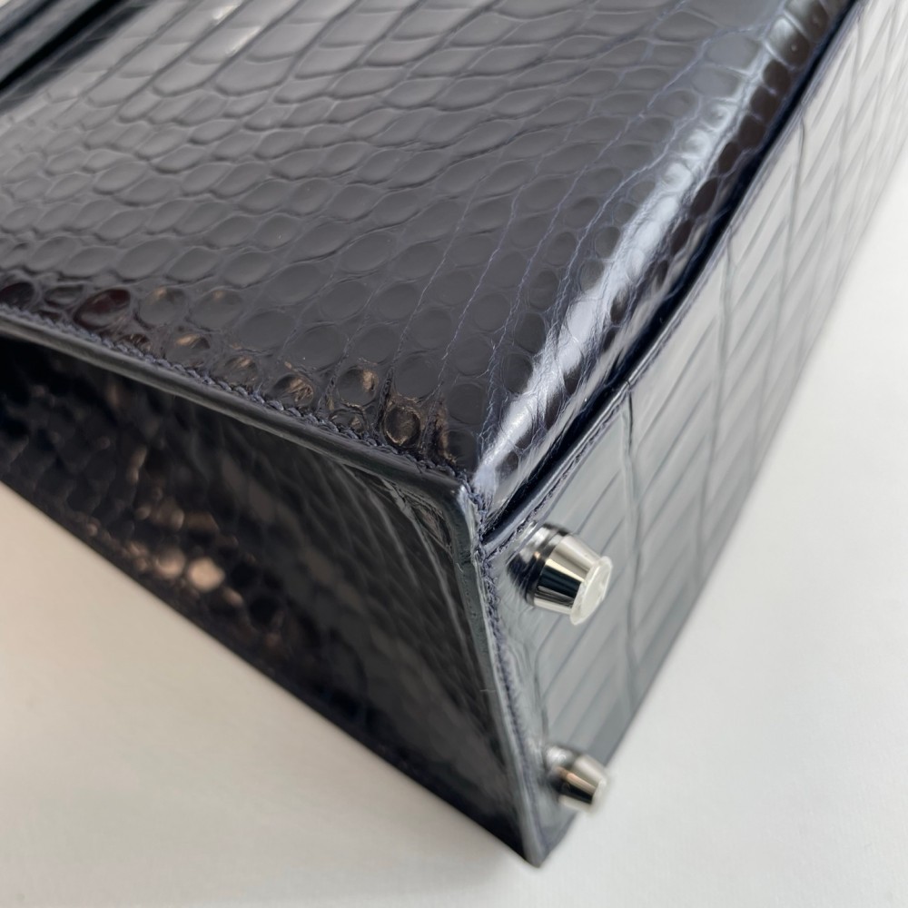 Hermes Kelly 35 in inverted V leather blue with silver hardware.