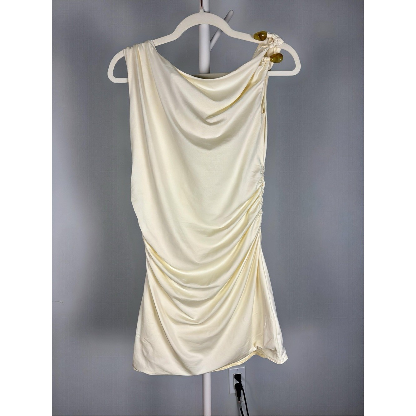 Peppermayo Pale Yellow Draped Mini Dress with one shoulder embellishment