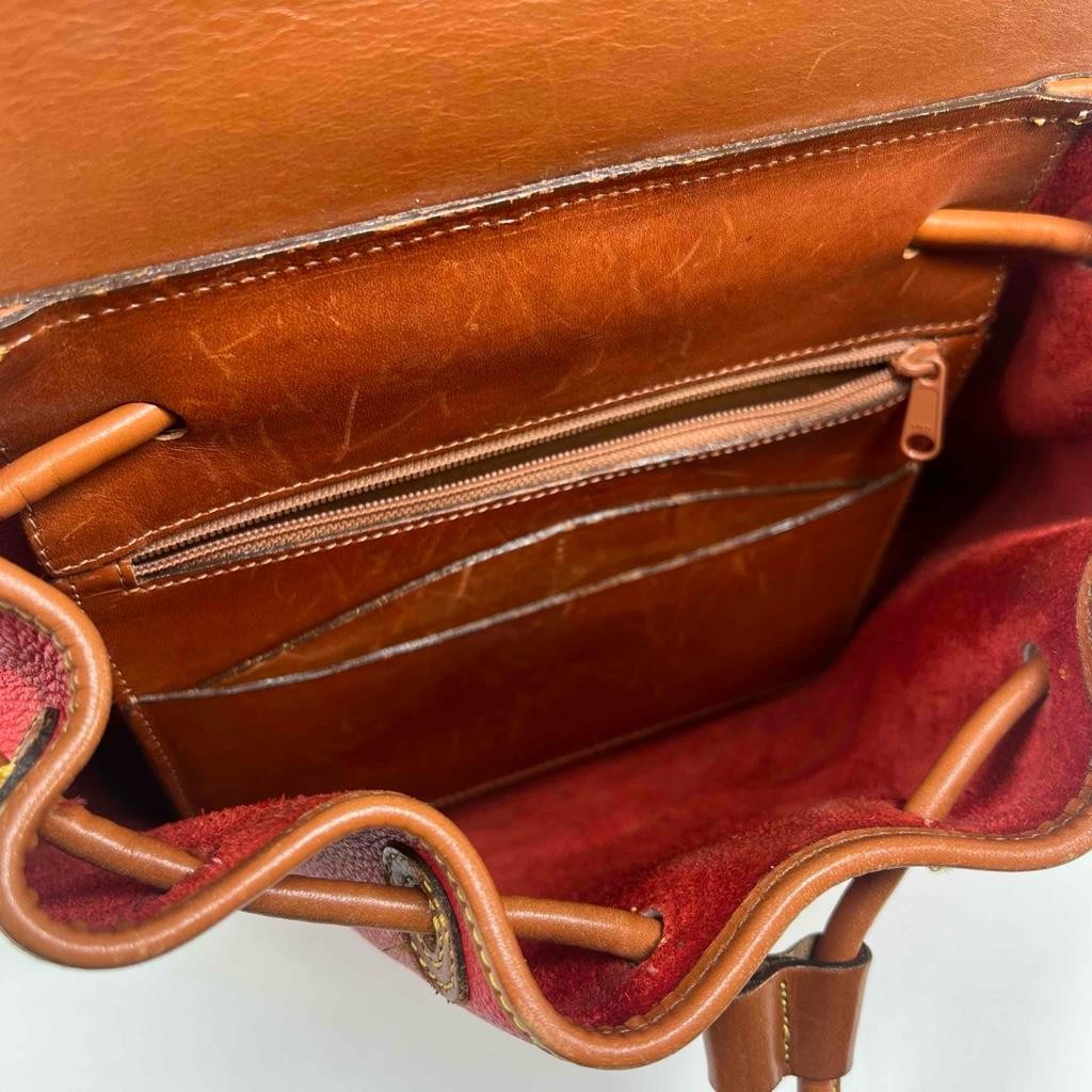 Dooney & Bourke Classic Collection All Weather Pebble Leather Red Tan Backpack
