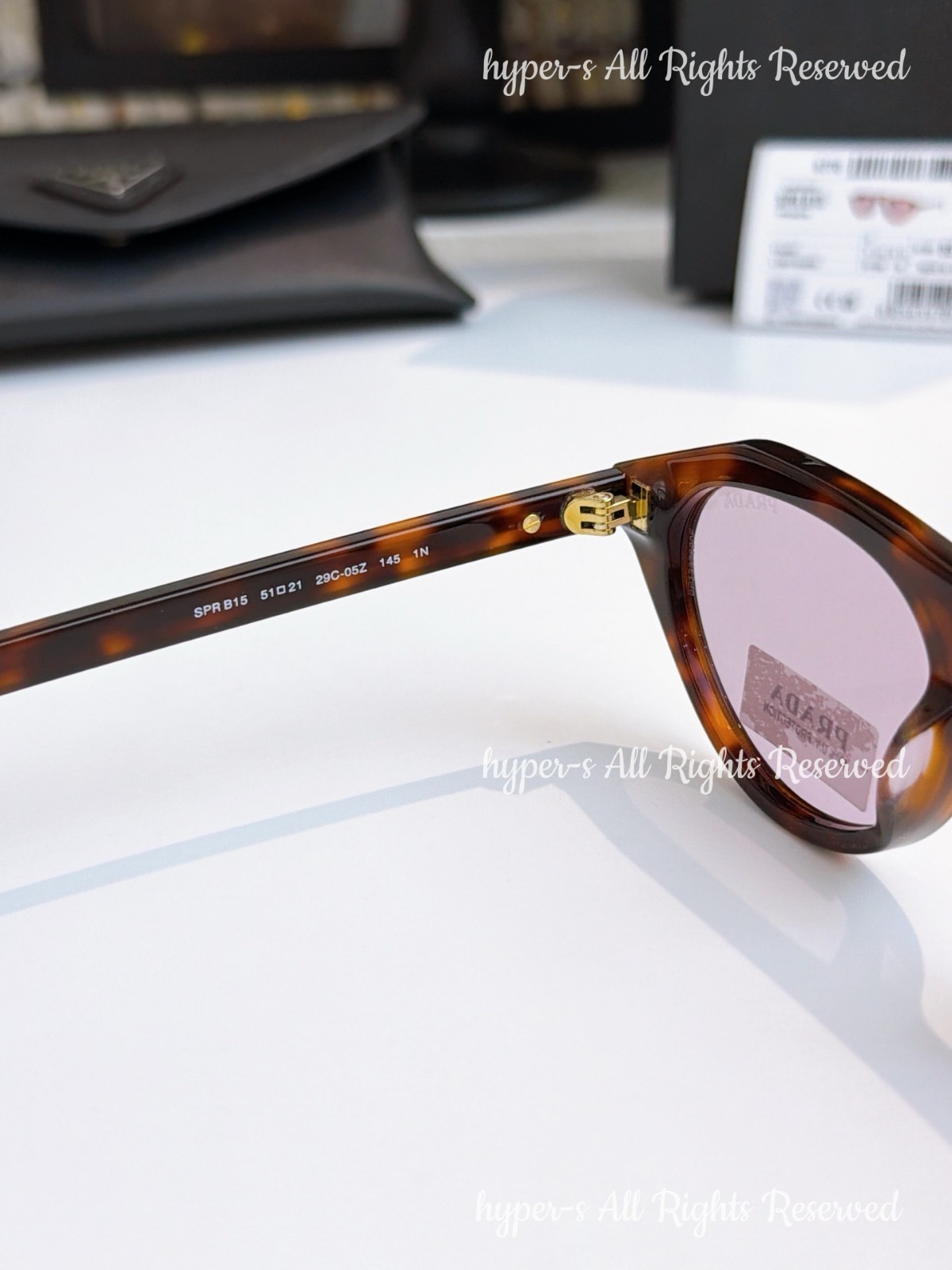 Prada SPR B15 Women Sunglasses Cat Eye Tortoiseshell Frame Purple Lenses UV400