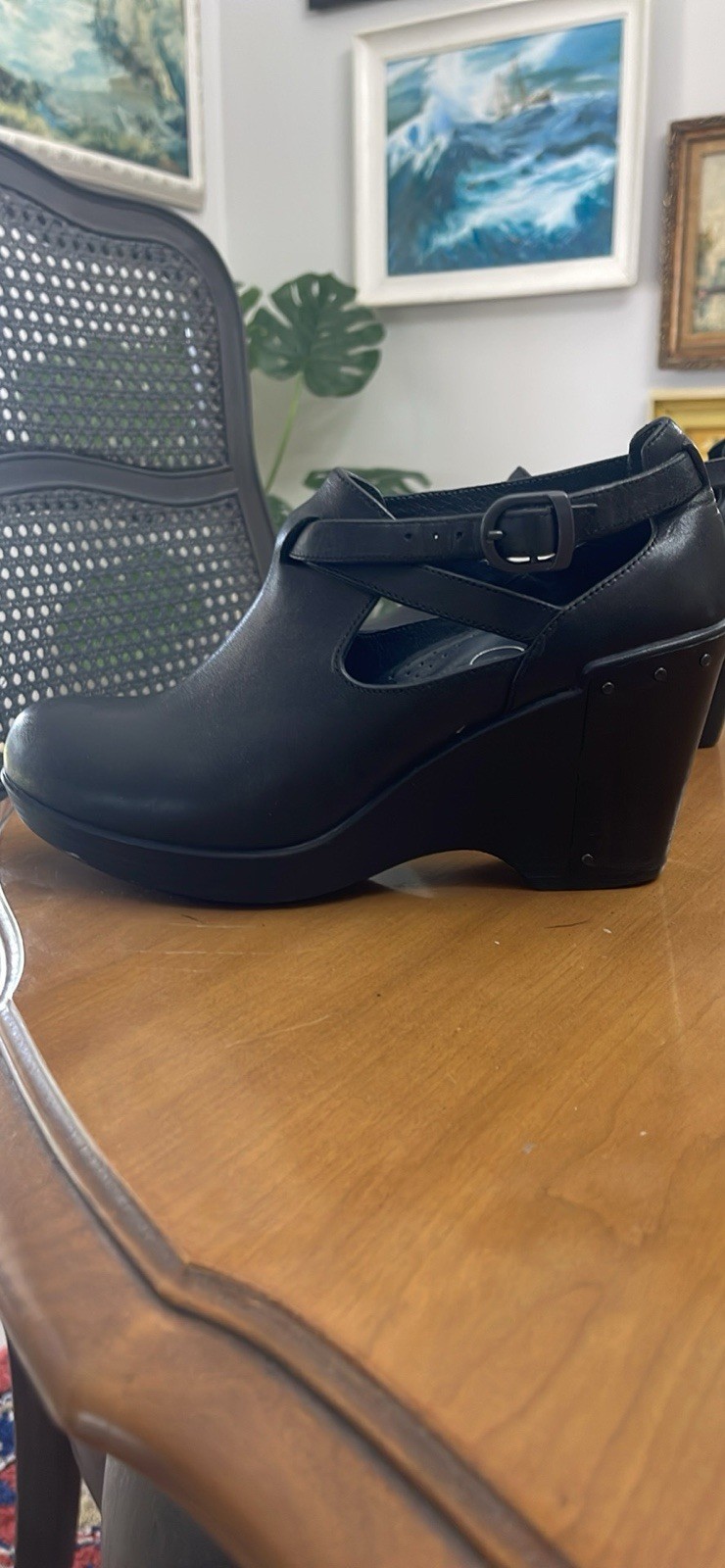 Dansko 37 Black Clogs with Buckle Strap and Metal Tooling on the Heel