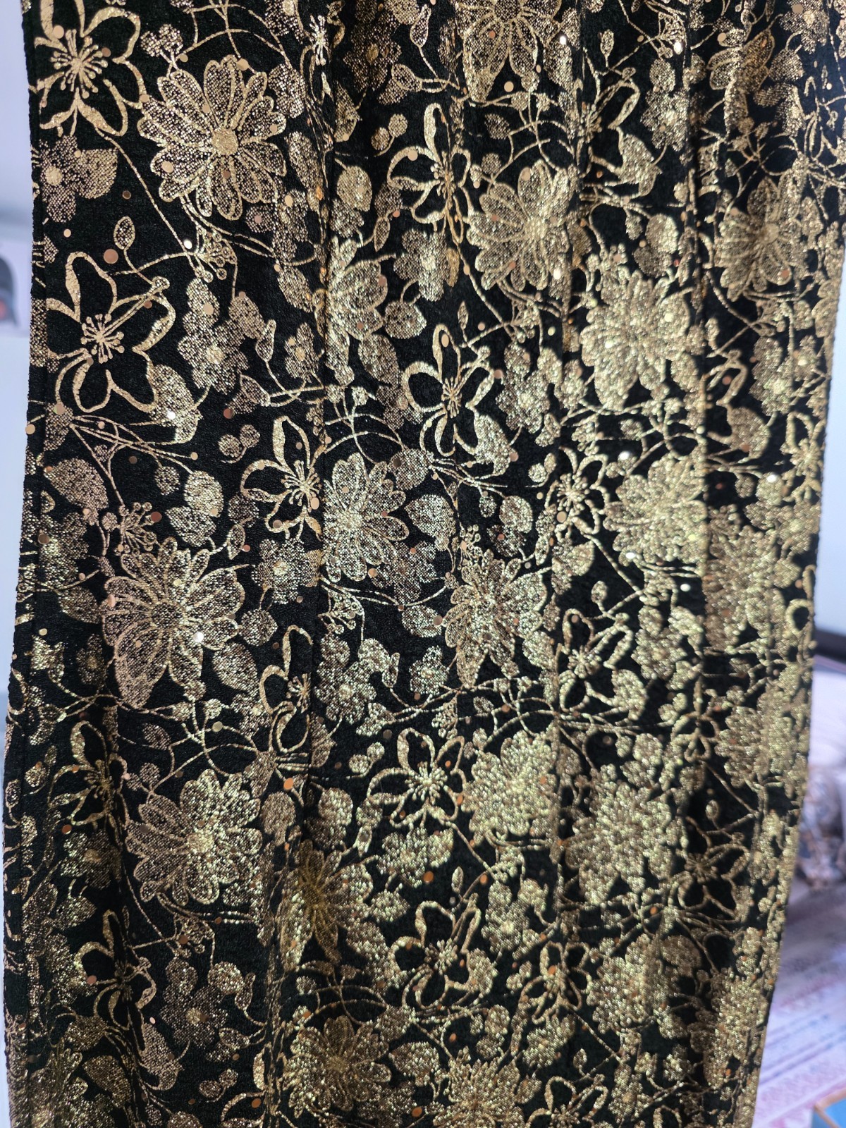 gold embelished black cocktail dress
