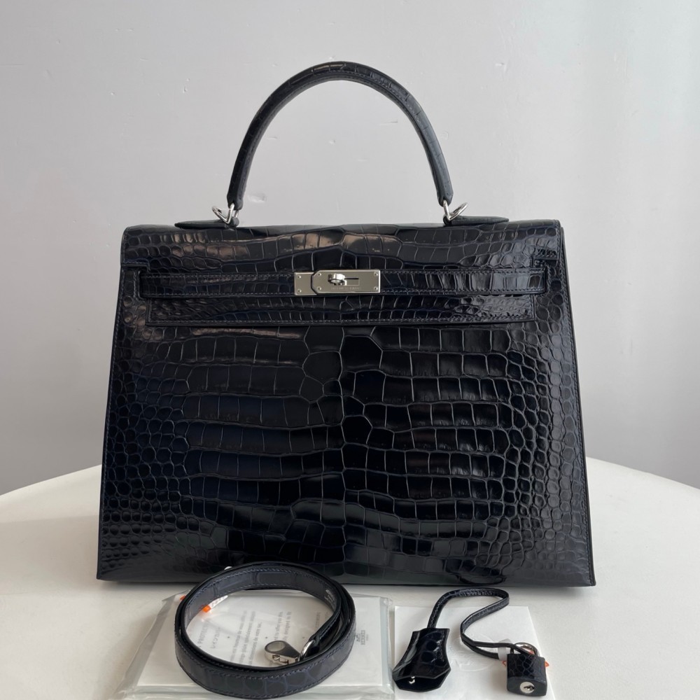 Hermes Kelly 35 in inverted V leather blue with silver hardware.