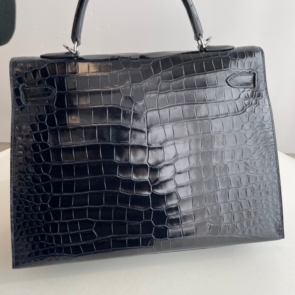 Hermes Kelly 35 in inverted V leather blue with silver hardware.