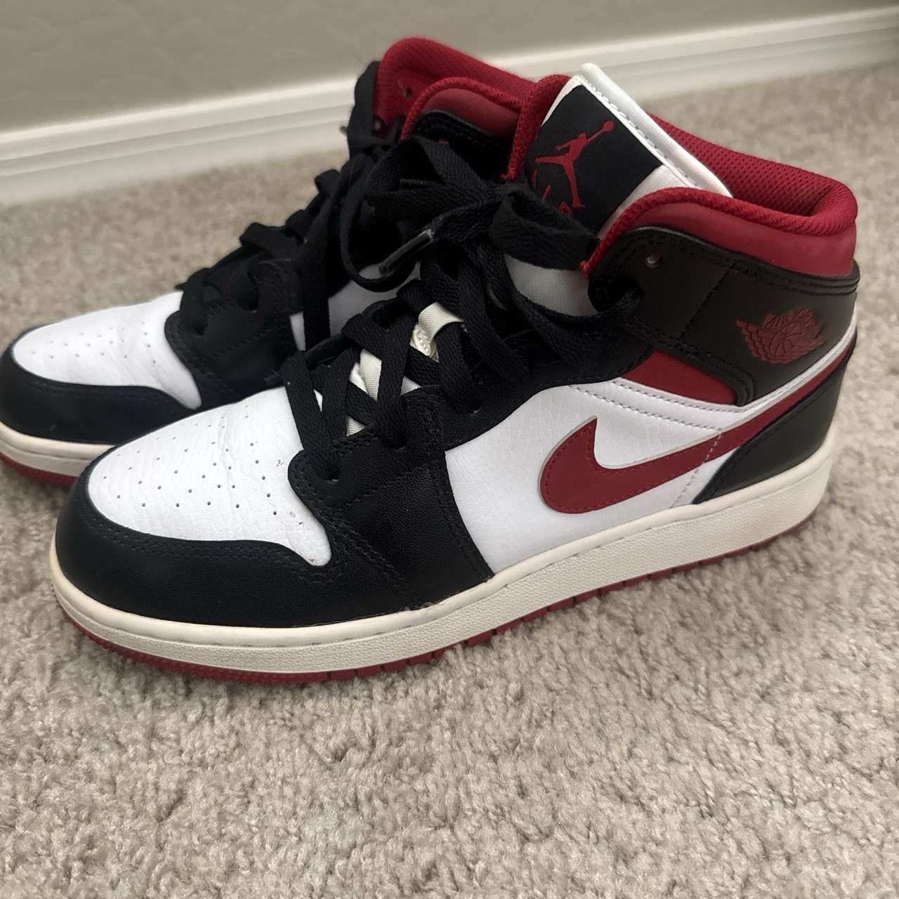 Air Jordan Sneakers in red, black & white