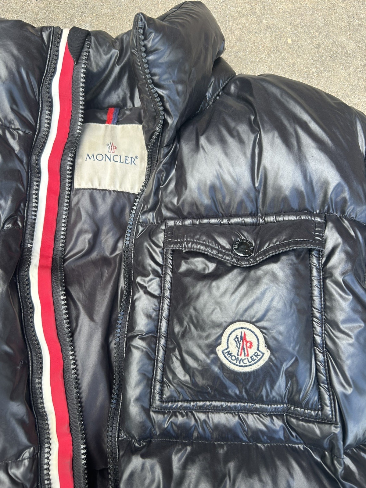 Moncler Black Insulated Zip Up Puffer Jacket with Logo & Zipper Accents