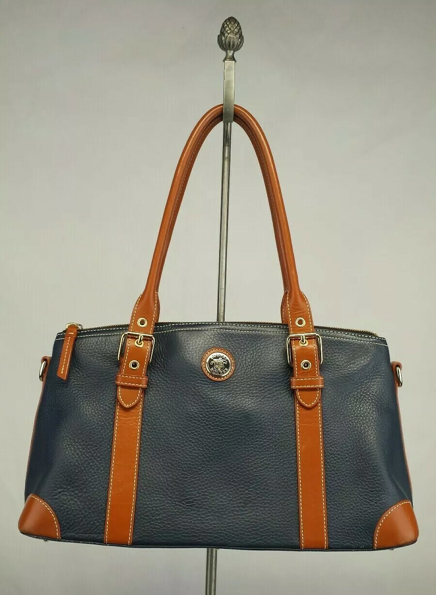 Dooney & Bourke Hand Bag golden hardware Color Navy Blue-cognac In Very Good C.