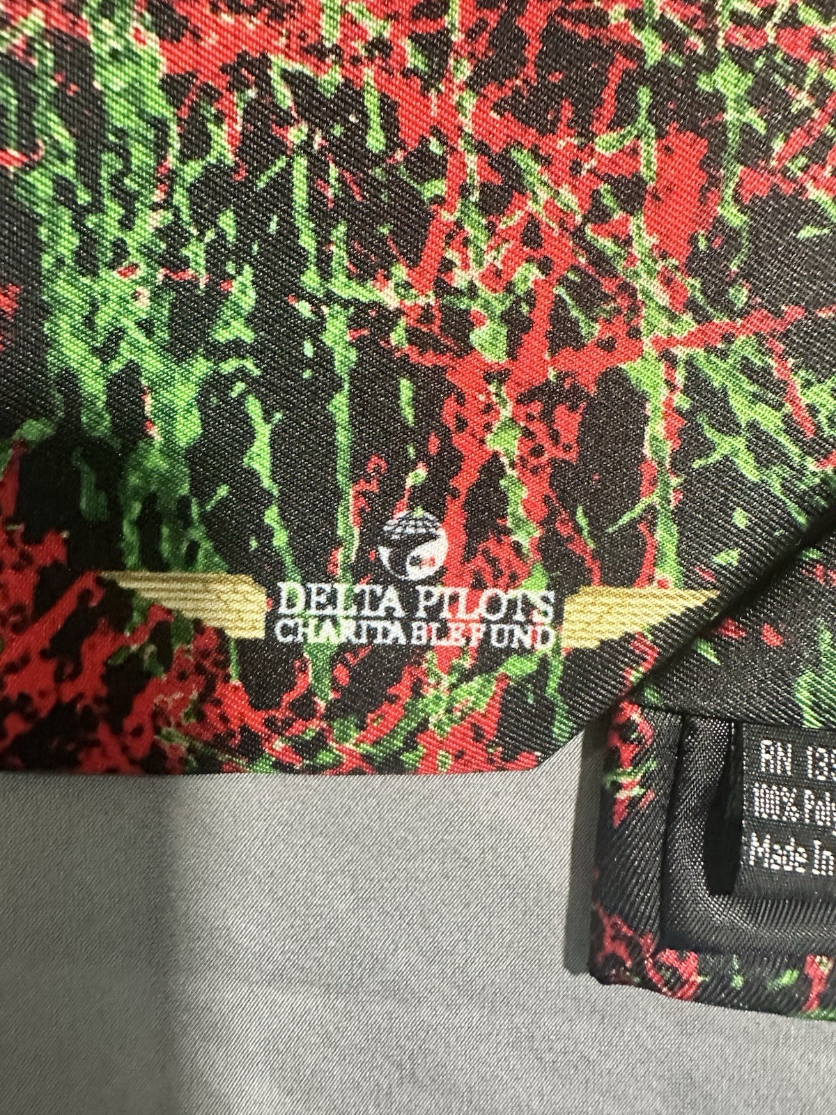 VTG Black With Red/Greem Splatter Necktie Delta Pilots