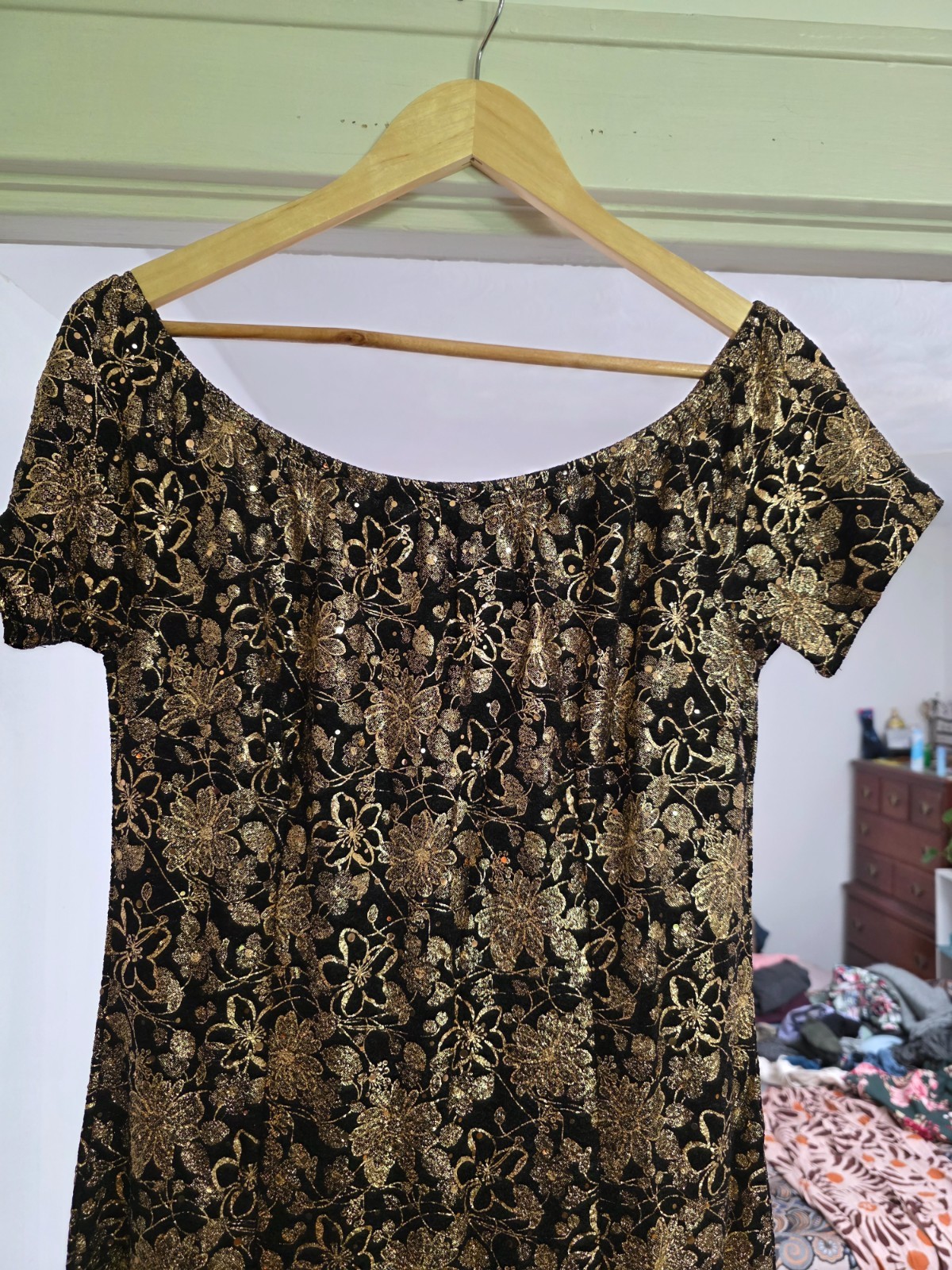 gold embelished black cocktail dress