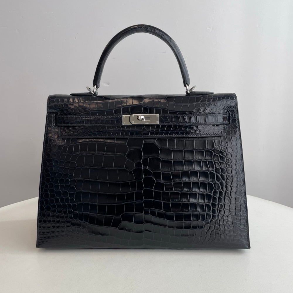 Hermes Kelly 35 in inverted V leather blue with silver hardware.