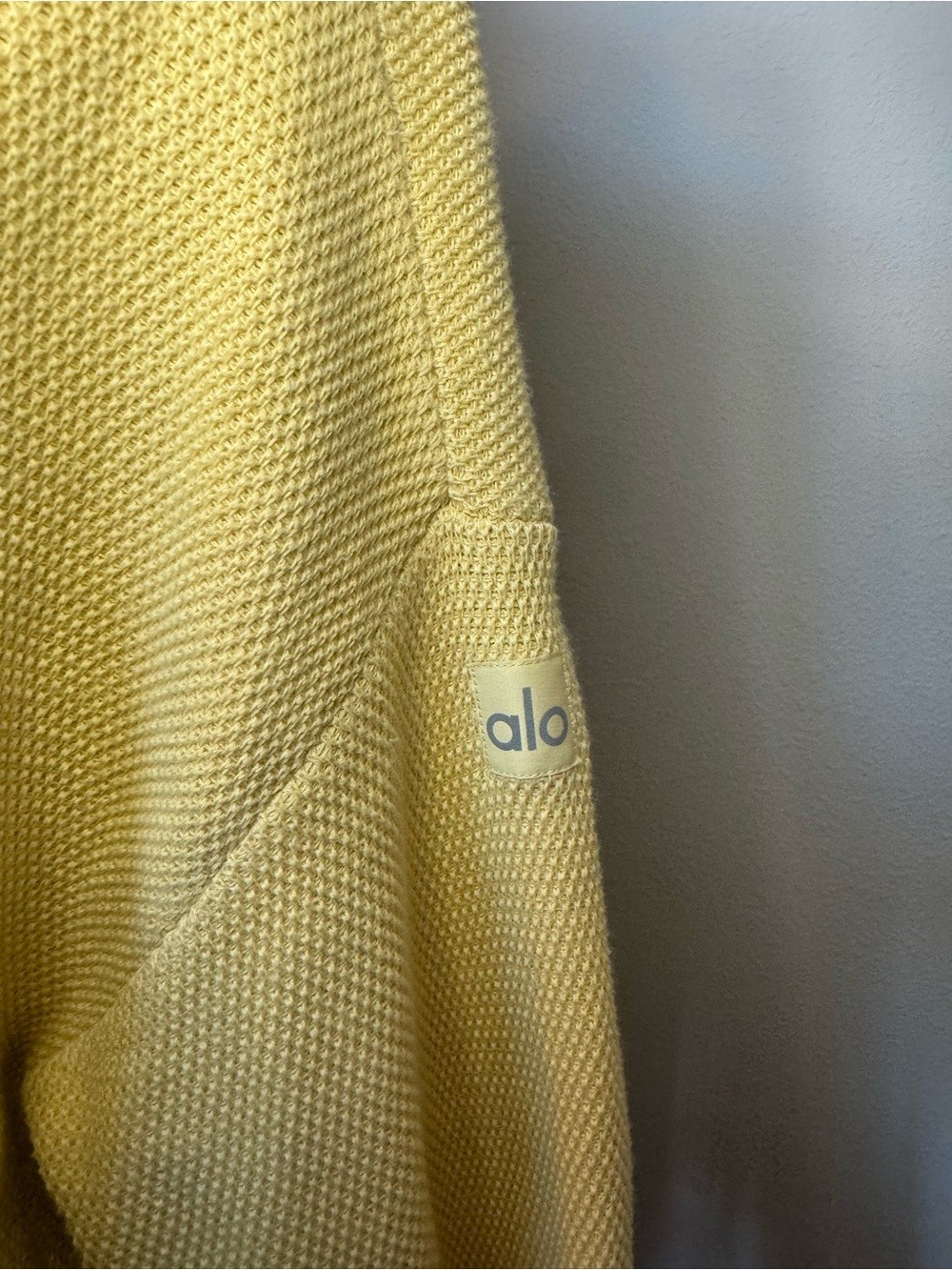 Alo Yoga “Tennis Club” cardigan in Butter Color