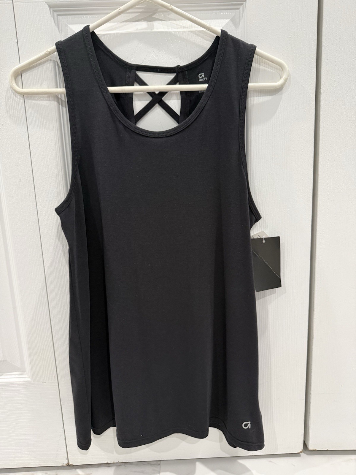 Women’s Gap Fit Sleeveless Black tank/criss cross back Size XS