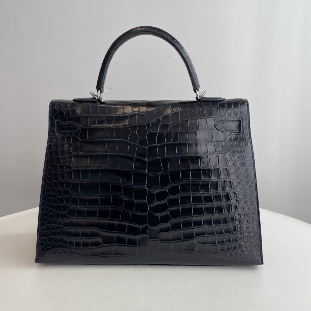 Hermes Kelly 35 in inverted V leather blue with silver hardware.