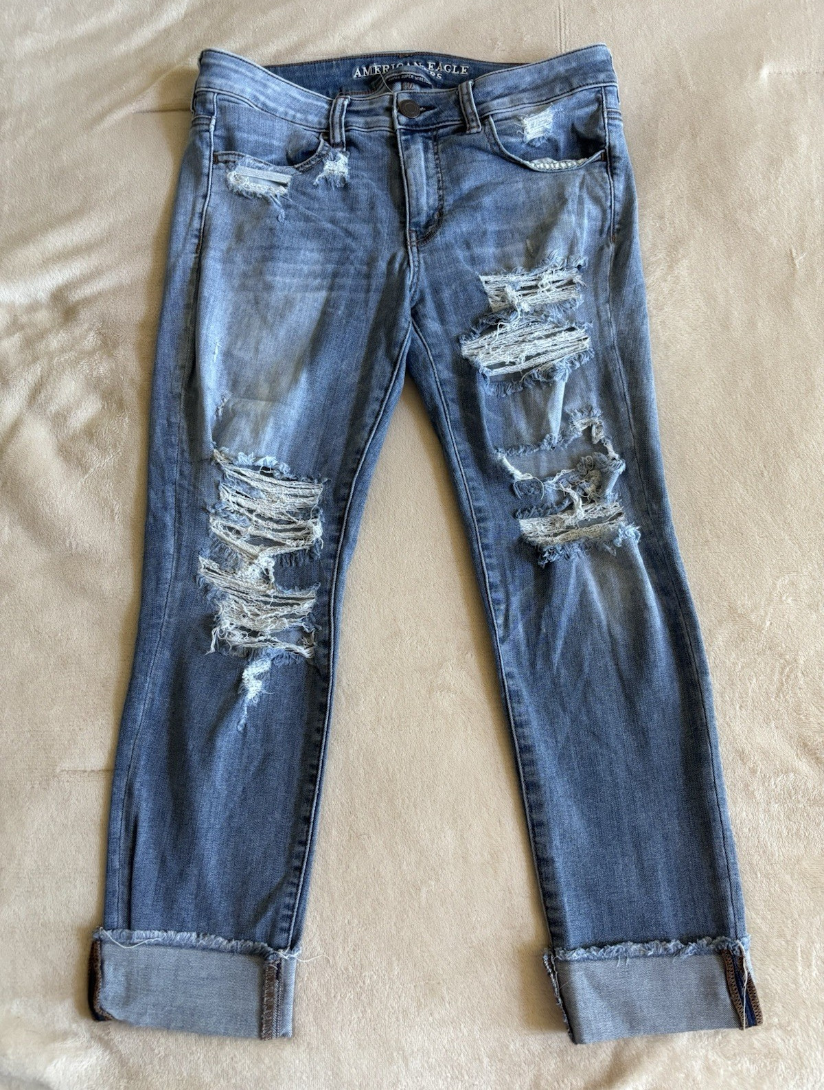 American Eagle Super Super Stretch Women’s Blue Light Wash Mid Rise Slim Jegging