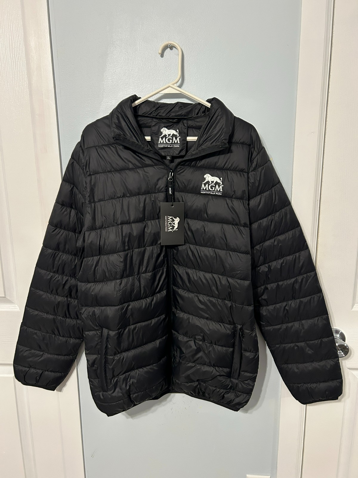 NWT Black Zipper Front Puffer Jacket with MGM Northfield Park Logo Size XL