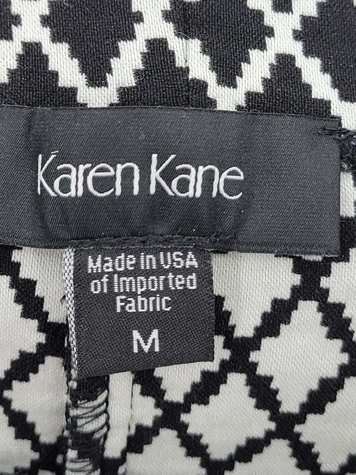 Karen Kane Top Womens Medium Black White Geo Print Bell Sleeve Artsy Blouse