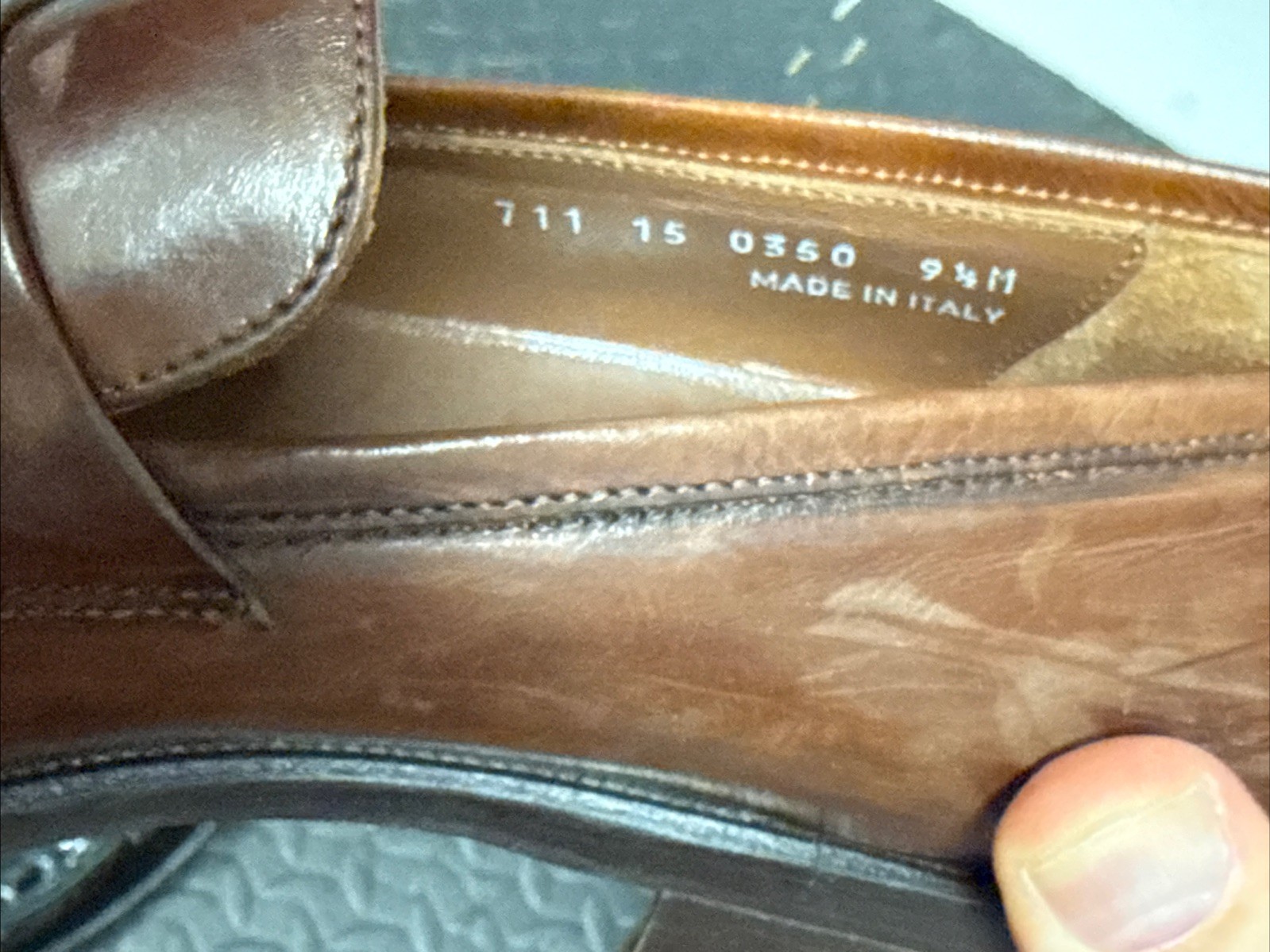 Three Pairs of Johnston and Murphy slip on shoes 9.5