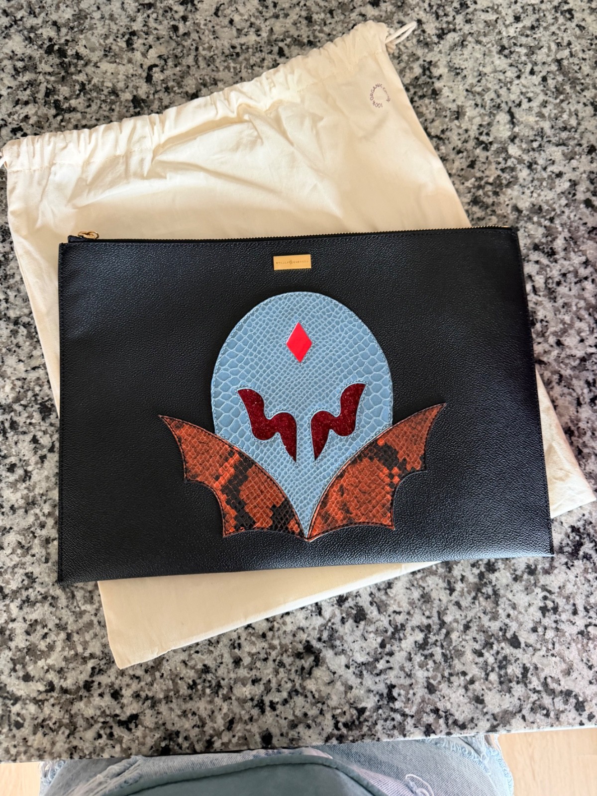 Stella McCartney “Super Hero” Applique Zip Clutch