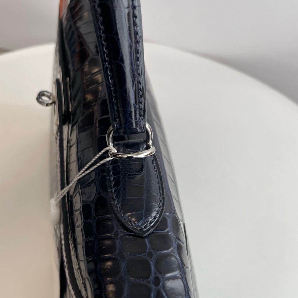 Hermes Kelly 35 in inverted V leather blue with silver hardware.